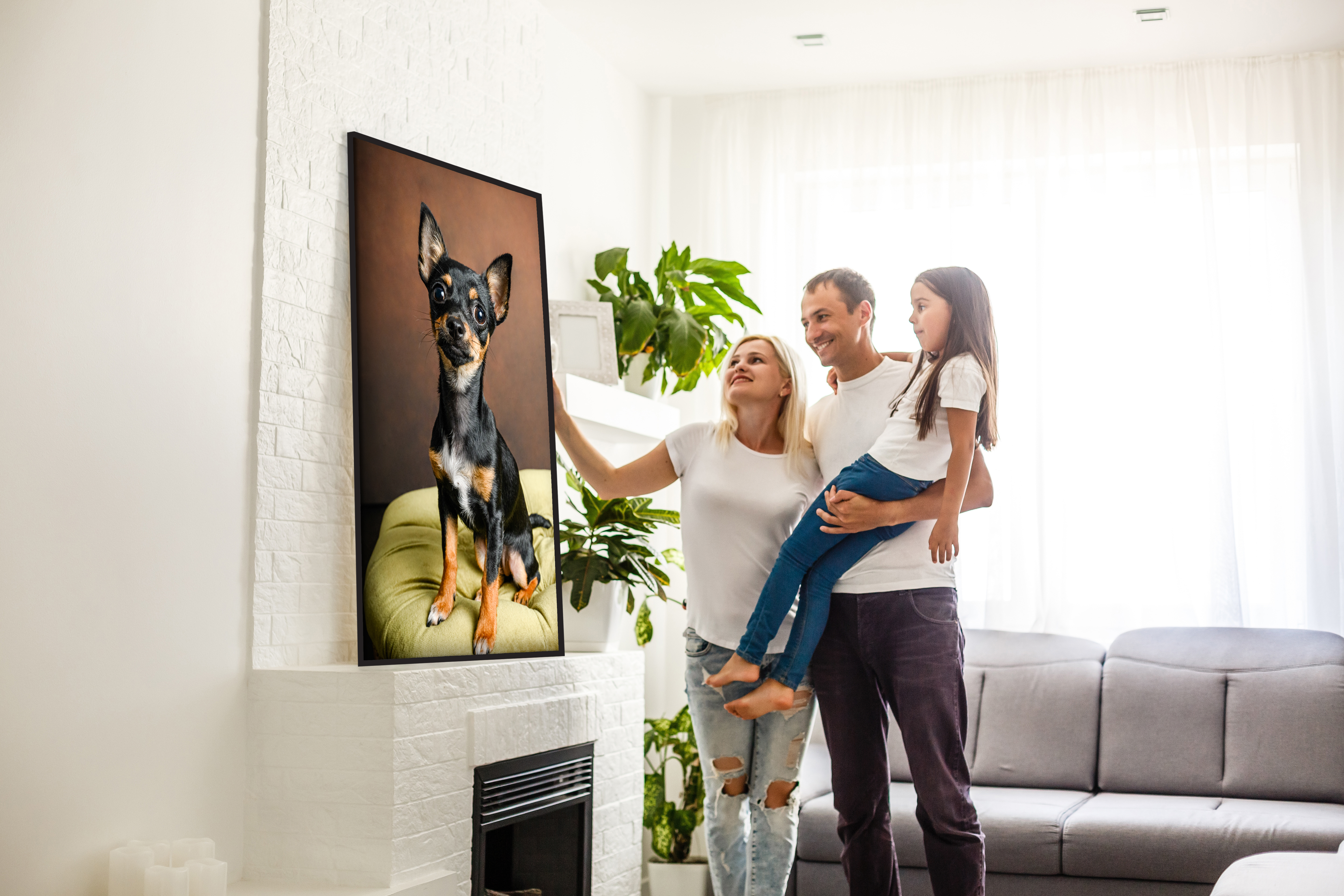 Family with wall portrait